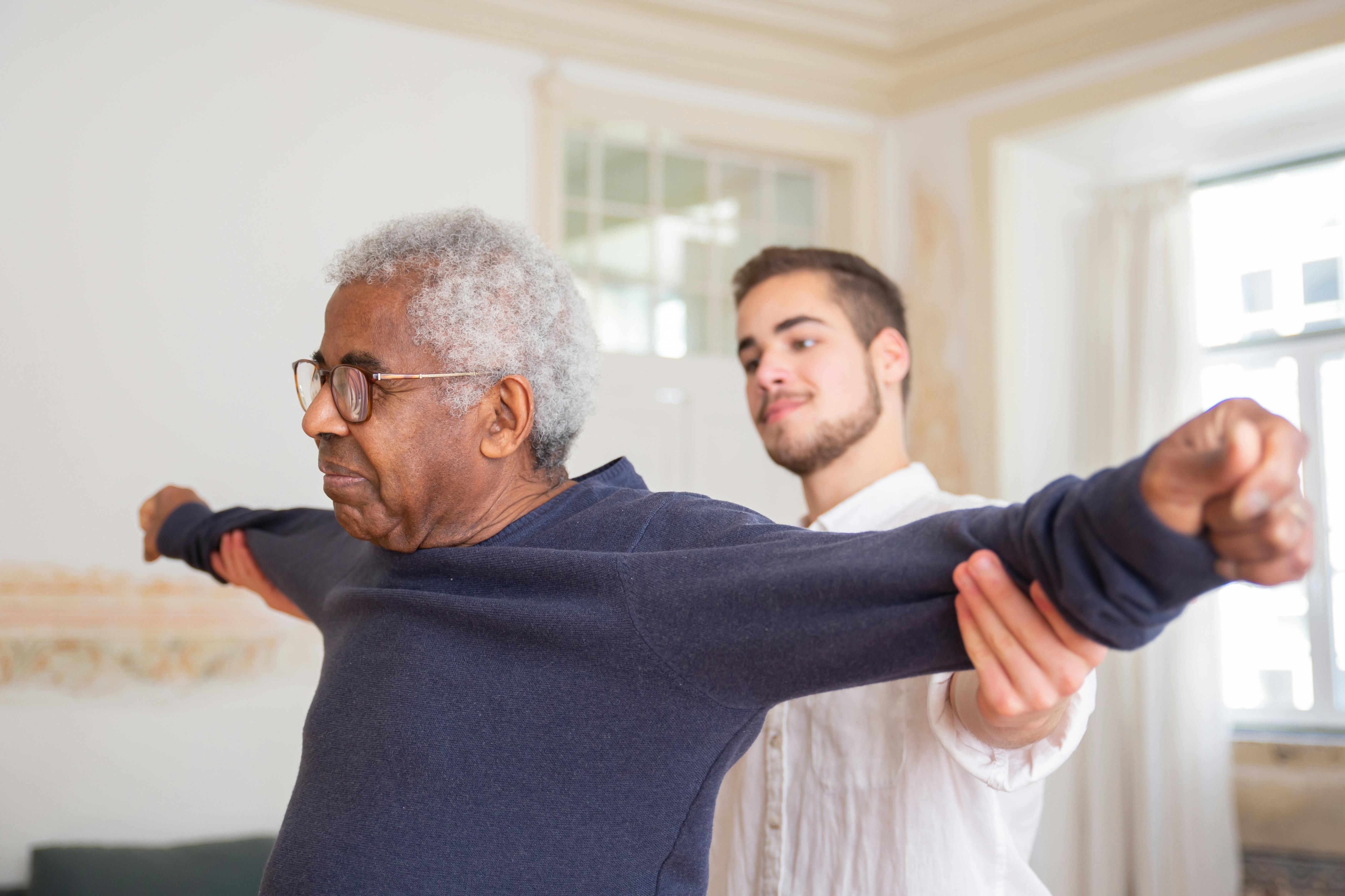 Resident in physical therapy session at The Waters of McKenzie
